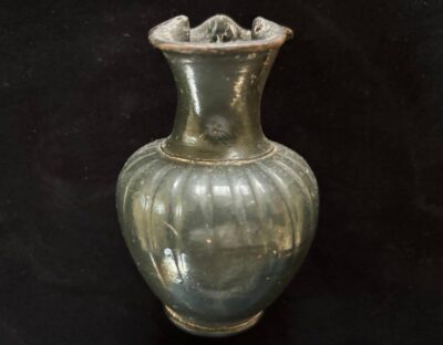A black glazed Oinoche